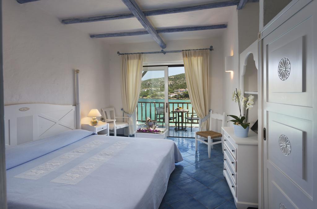 Club Hotel Baja Sardinia Ruang foto